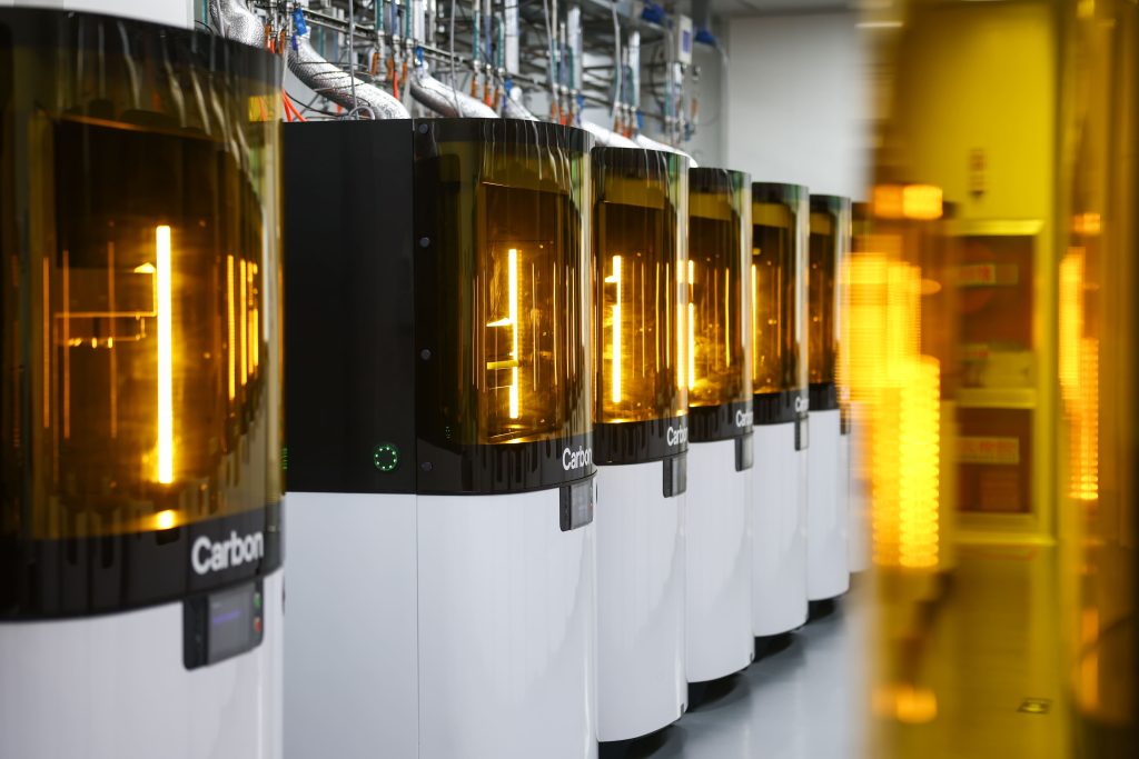 A-Carbon-3D-printer-fleet-at-an-Oechsler-facility.-Photo-via-Oechsler.-1024x683.jpg